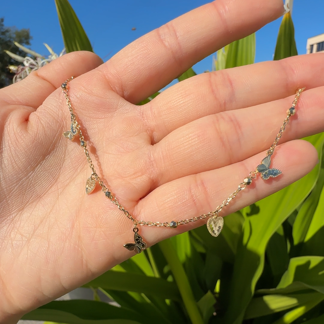 18K Yellow Gold Diamond Cut Heart and Butterfly Charm Bracelet